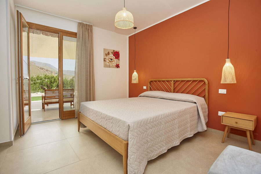 Charming Bedroom with Terrace View at Villa Pietra Dorata – Sicily Luxury Villas