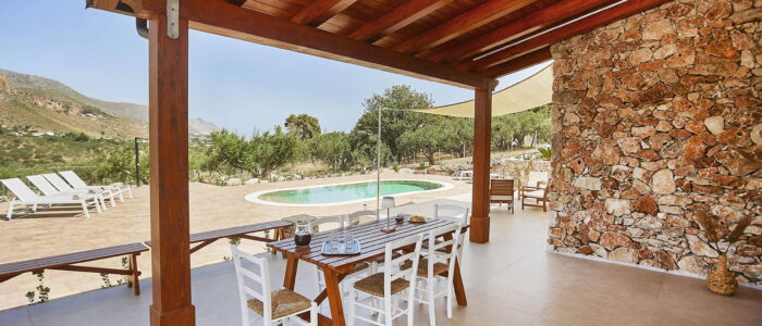 Scenic Outdoor Dining Area with Pool View at Villa Pietra Dorata – Sicily Luxury Villas